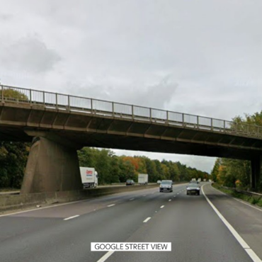 Two teenagers dead after car falls off bridge and crashes into minibus on motorway