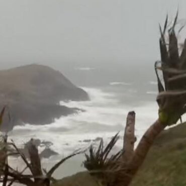 Battered coasts, wobbly planes and closed roads as Storm Dave sweeps through the UK