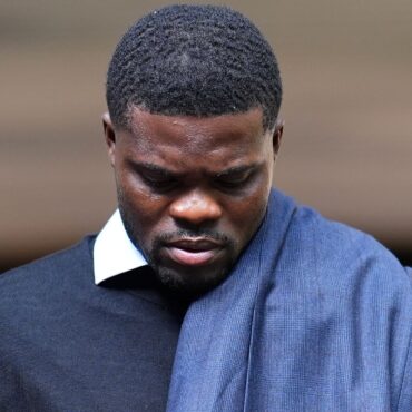Ex-Arsenal footballer pleads not guilty to two further charges of rape