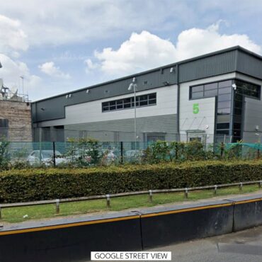 Three charged over arson attack on media group