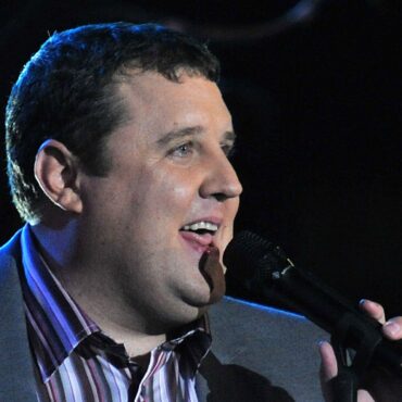Teenager charged after bomb hoax at Peter Kay show