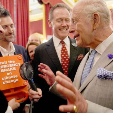 Charles joins climate reception on hottest June day on record