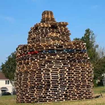 Man dies after falling from Belfast bonfire
