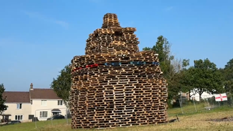 Man dies after falling from Belfast bonfire