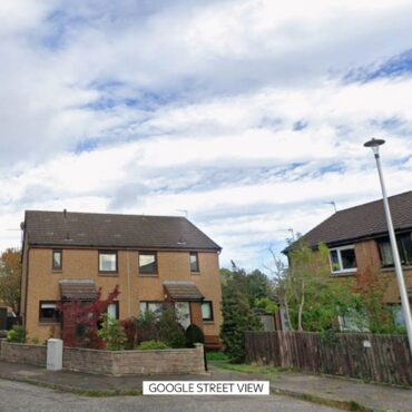 Woman dies and man arrested following disturbance at property
