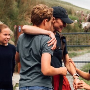 Kate hugs family at end of hiking challenge in newly-released photos