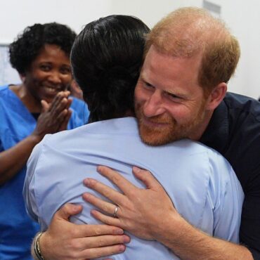 Prince Harry visits hospital as William plays crazy golf and Charles examines a penguin