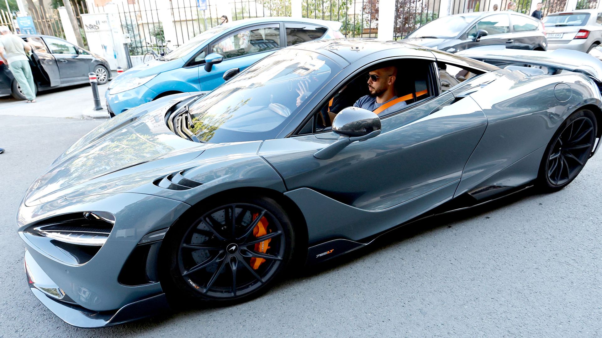 Andrew Tate rented supercars to appear ‘uberwealthy’, lawyers say