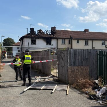 Two people die and woman critical after house fire ‘possibly linked to organised crime’