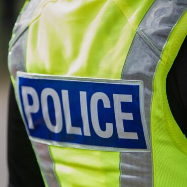 Man dies in crash after pursuit involving police car