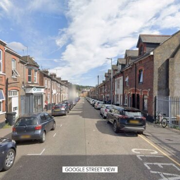 Man shot by police after woman stabbed