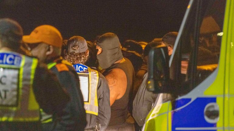 Three people charged with assaulting emergency worker after migrant boat protest
