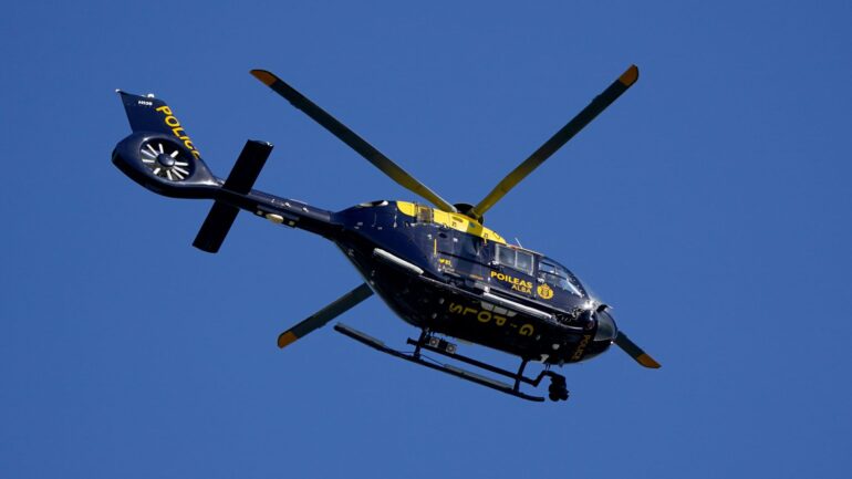 Hunt for women and man after driver killed in hit-and-run crash near airport