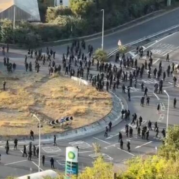 Dozens of masked men stop traffic at Port of Dover