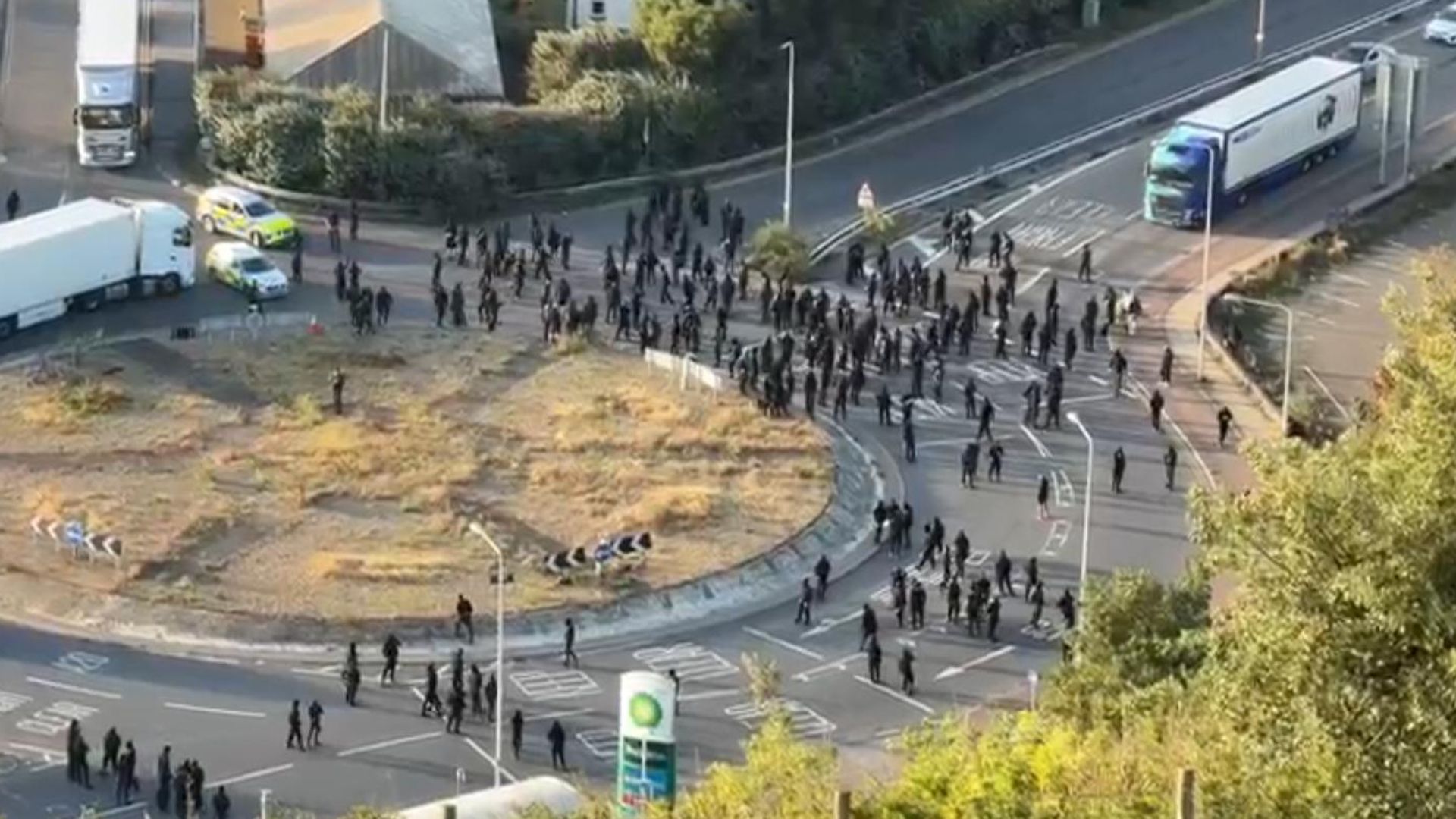 Dozens of masked men stop traffic at Port of Dover