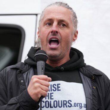 Founder of group that put flags on lampposts charged with 14 offences