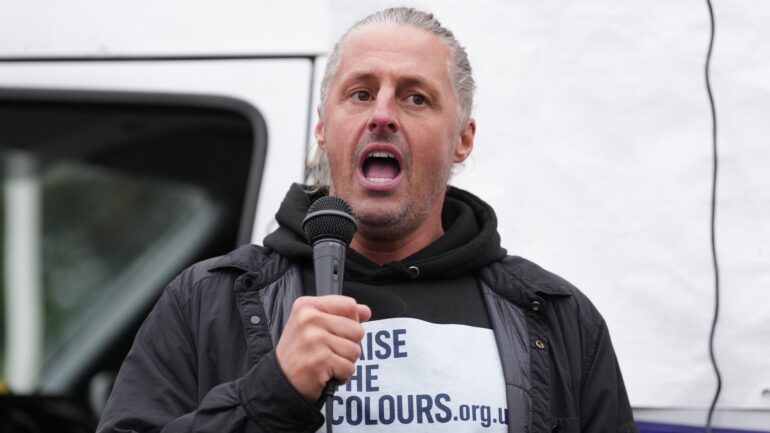 Founder of group that put flags on lampposts charged with 14 offences