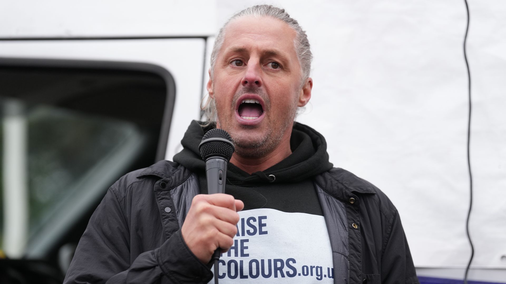Founder of group that put flags on lampposts charged with 14 offences
