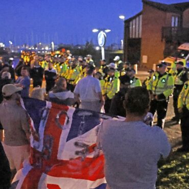 Twelve people arrested after anti-migrant protest at seaside town