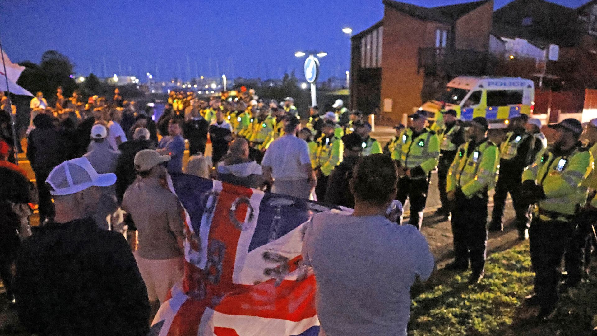Twelve people arrested after anti-migrant protest at seaside town